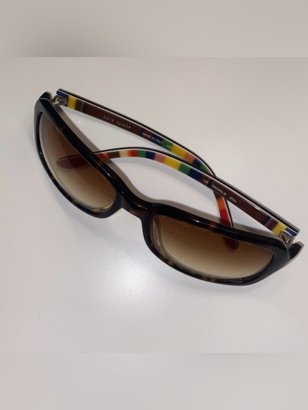 kate spade tortoiseshell sunglasses with rainbow-striped temples
